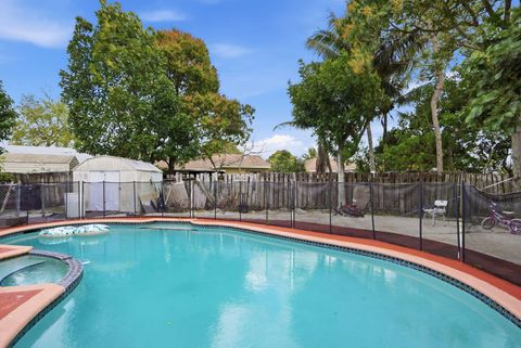 Tiny photo for 1301 SW 75th Avenue, North Lauderdale, FL 33068 (MLS # R11169529)
