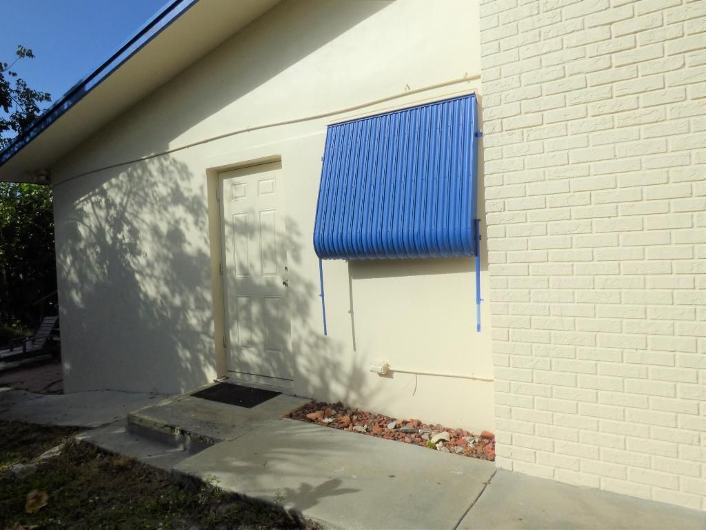 Photo of 3838 NE Melba Drive #R, Jensen Beach, FL 34957 (MLS # R10949085)