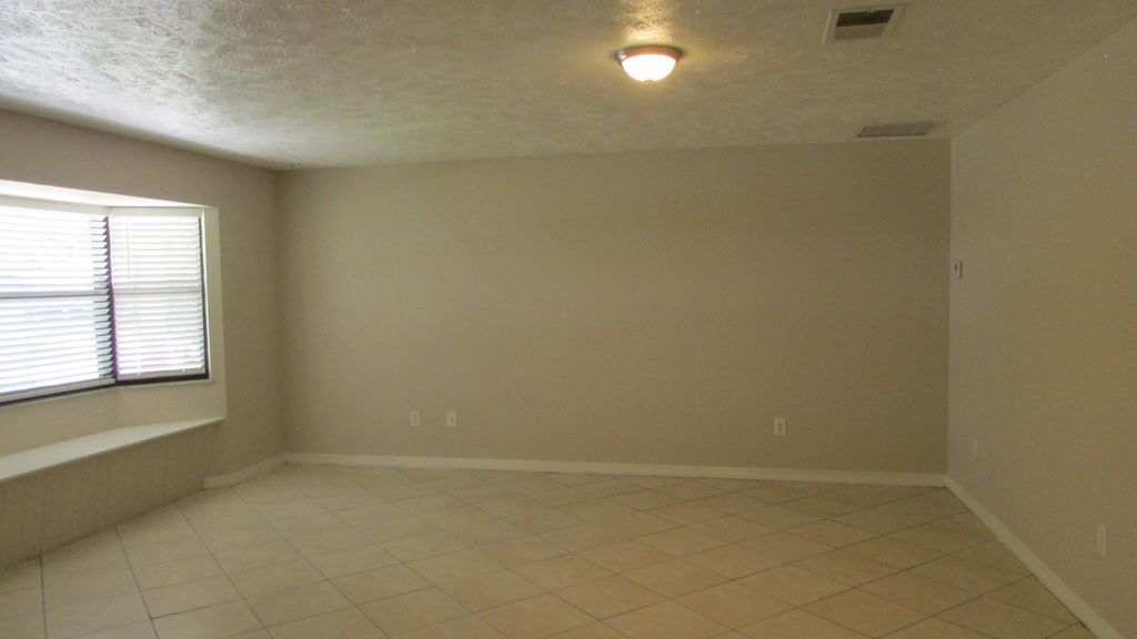 Photo of 1173 SW Sudder Avenue, Port Saint Lucie, FL 34953 (MLS # R11011743)