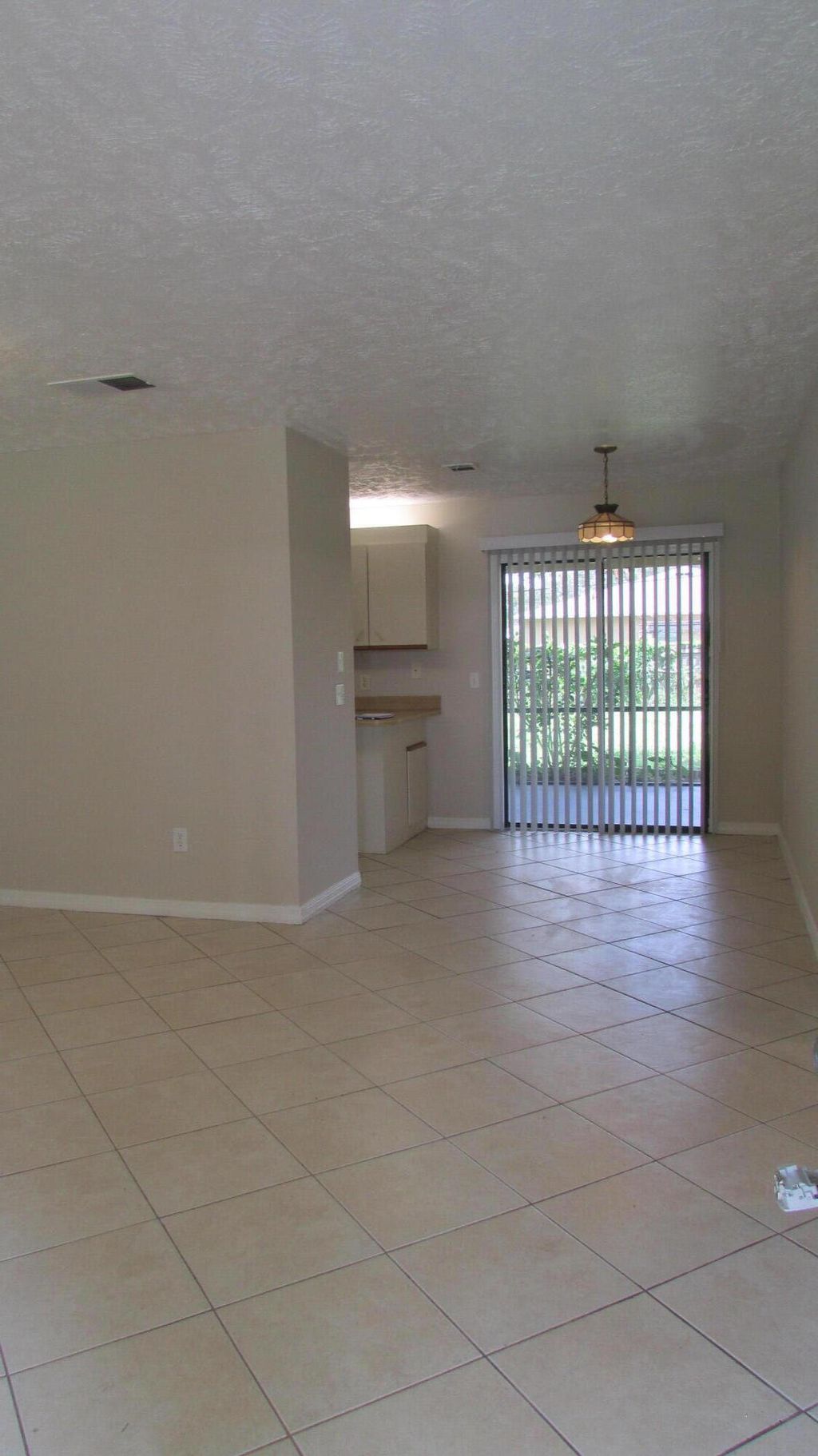 Photo of 1173 SW Sudder Avenue, Port Saint Lucie, FL 34953 (MLS # R11011743)