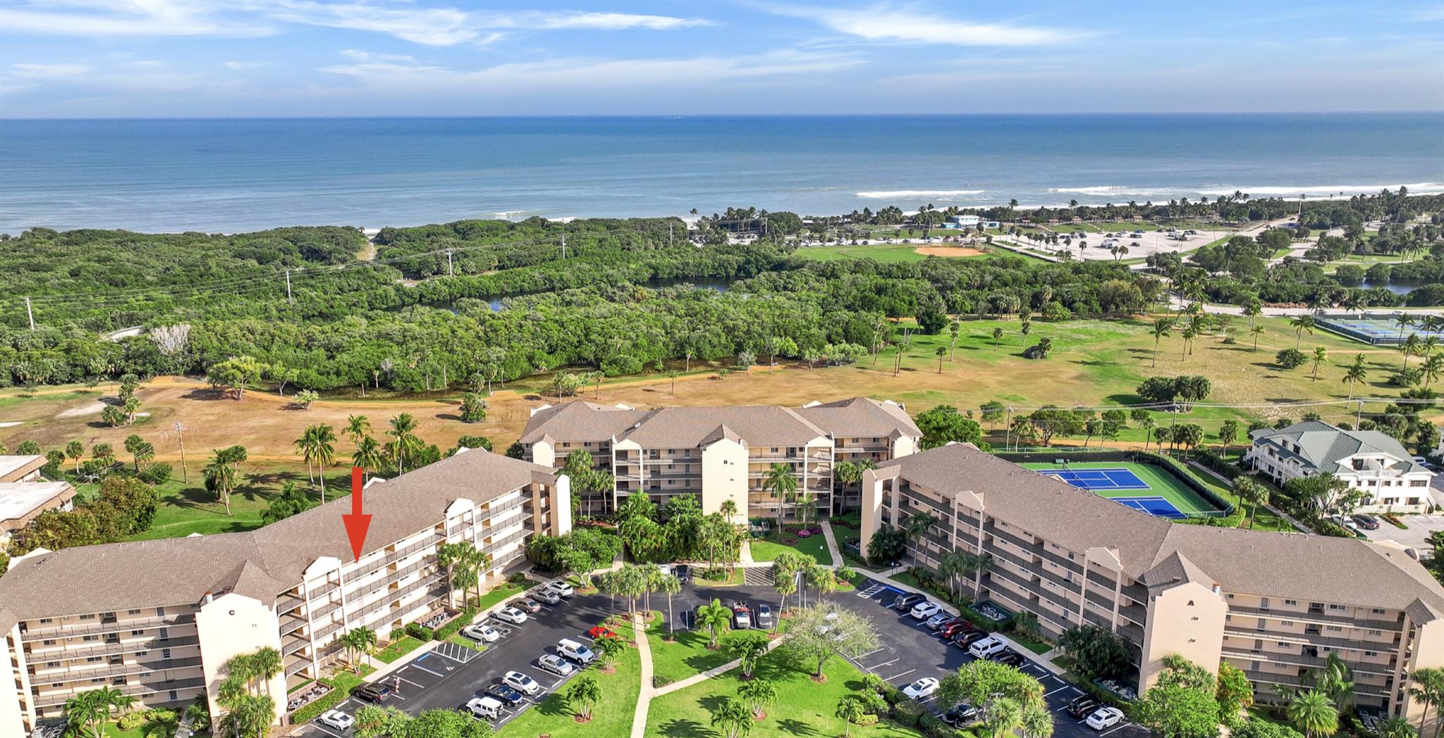 WELCOME HOME! This turnkey condominium is set in the alluring ''Resort-Style'' community of Jupiter Bay. Located in the ''Heart of Jupiter'' this one-of-kind locale is BEACH living at it's finest! This unique one bedroom one and a half bath unit has an OCEAN VIEW. Living ''The JUPlife!'' is experiential living at its best! This property is GREAT for rentals or full-time residency. NOTE: A full concrete restoration project and new roof were completed 2025 on this building. Work is DONE at Jupiter Bay East Building ''C.'' This is a MUST SEE!