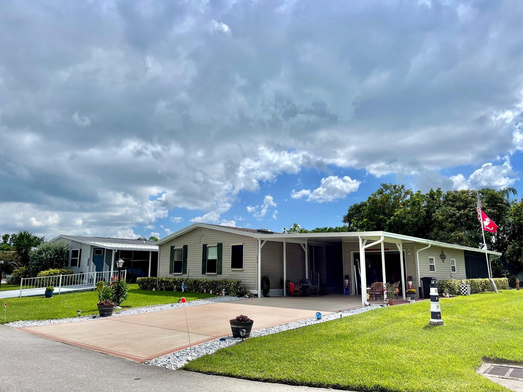 LAND OWNED charming home in the desired community of Savanna Club! Roof & A/C 2017. Roof has ownership transferrable solar panels. Water heater 2022. Brand new carport with 4th wall (or break-away wall). Some newer appliances. Laminate & carpet throughout in 2020. New well & pump for irrigation. Driveway repainted 2020. Newer vapor barrier & A/C ducts. Savanna Club boasts 3 pools, 2 clubhouses & a rec center. Super spacious lanai with tile flooring & acrylic windows. This is a MUST SEE & won't last! LAND OWNED!!!
