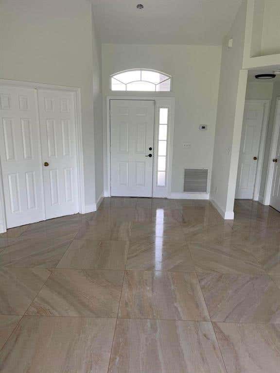Photo of 2619 SW Fair Isle Road, Port Saint Lucie, FL 34987 (MLS # R10819180)