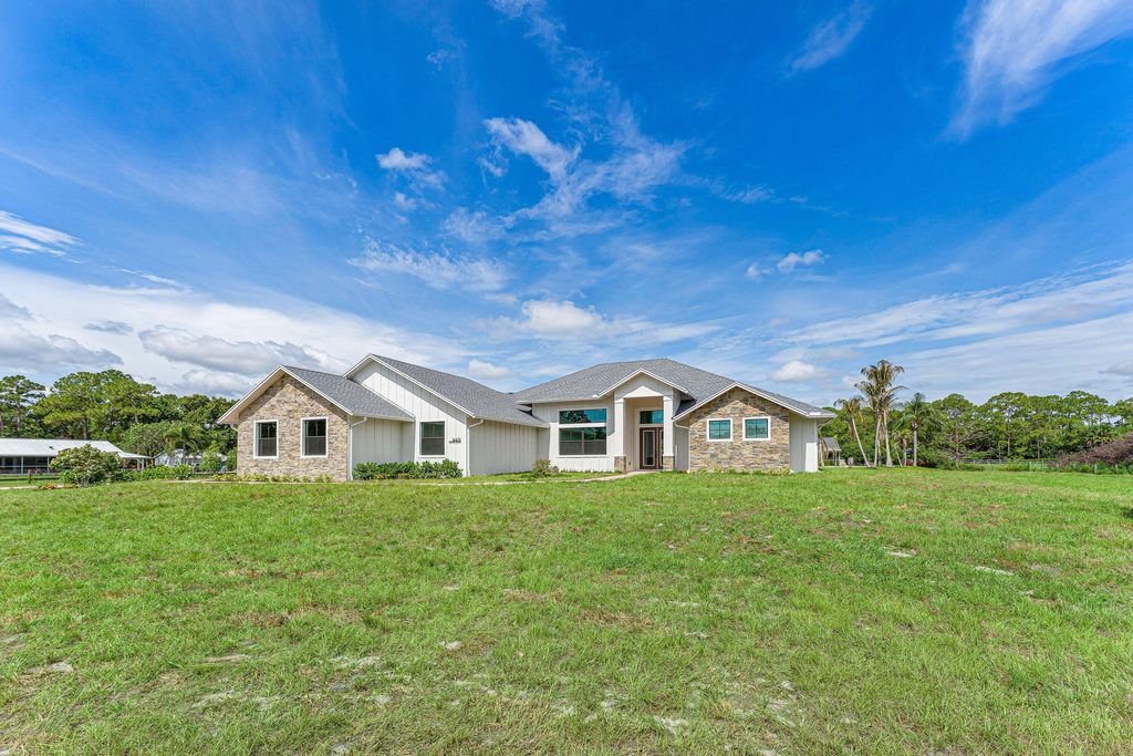Photo of 16631 132nd Terrace N, Jupiter, FL 33478 (MLS # B26040202)