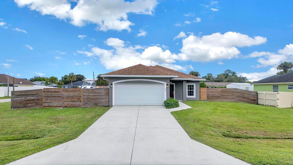 Photo of 2001 SW Aguero Street, Port Saint Lucie, FL 34953 (MLS # B26059464)