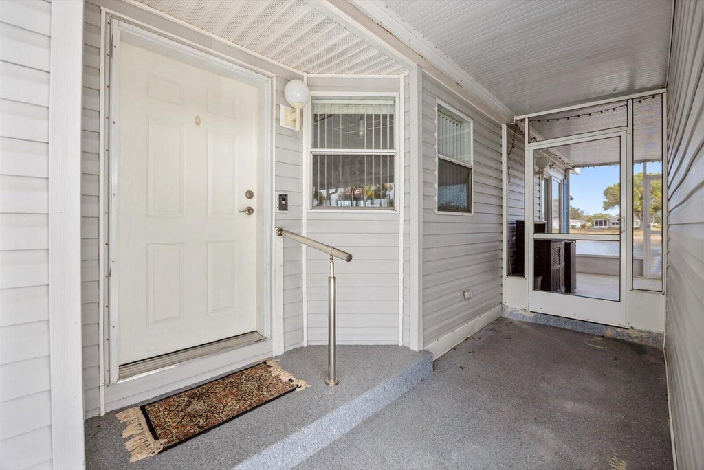 Photo of 8032 Meadowlark Lane, Port Saint Lucie, FL 34952 (MLS # B26038082)
