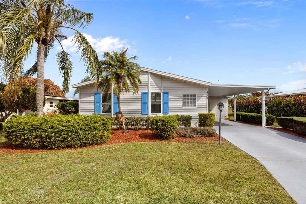 Photo of 8032 Meadowlark Lane, Port Saint Lucie, FL 34952 (MLS # B26038082)