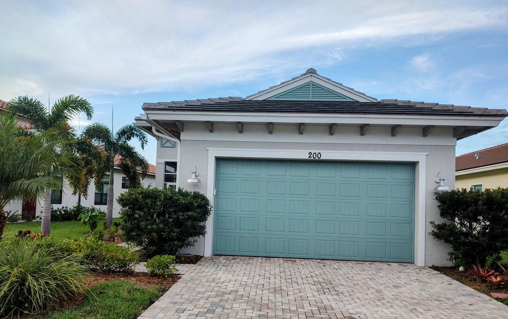 Photo of 200 SE Via Tirso, Port Saint Lucie, FL 34952 (MLS # R10947606)