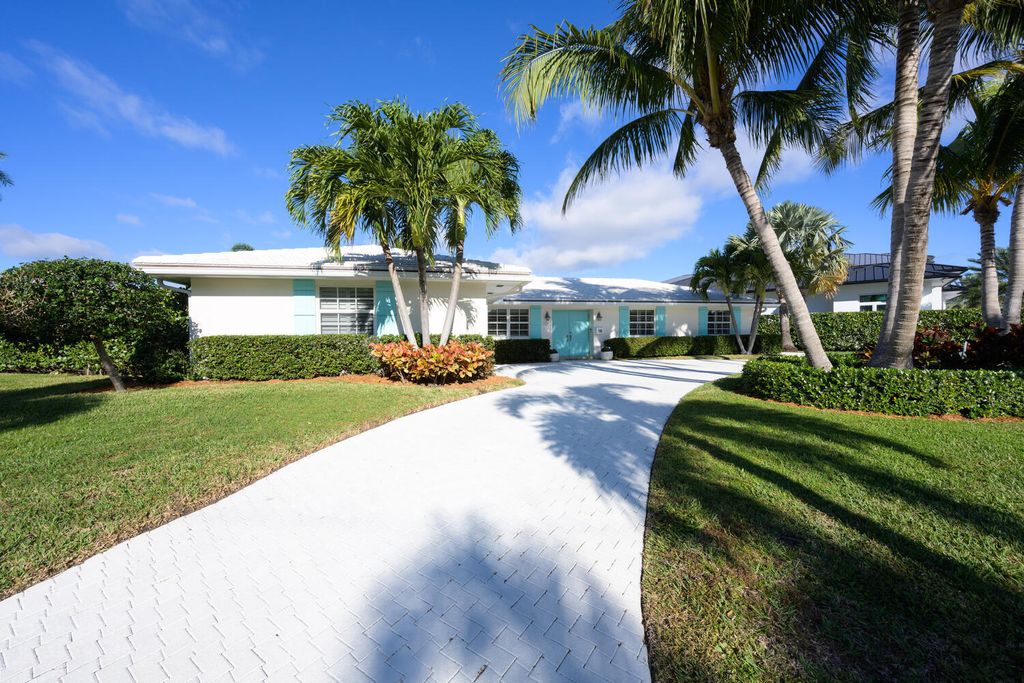 Photo of 705 Waterway Drive, North Palm Beach, FL 33408 (MLS # R10955275)