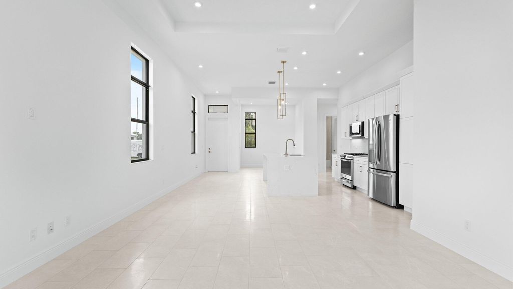 Photo of 375 SE Via Sangro, Port Saint Lucie, FL 34952 (MLS # B26003182)