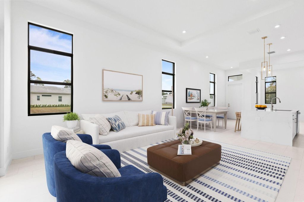 Photo of 375 SE Via Sangro, Port Saint Lucie, FL 34952 (MLS # B26003182)