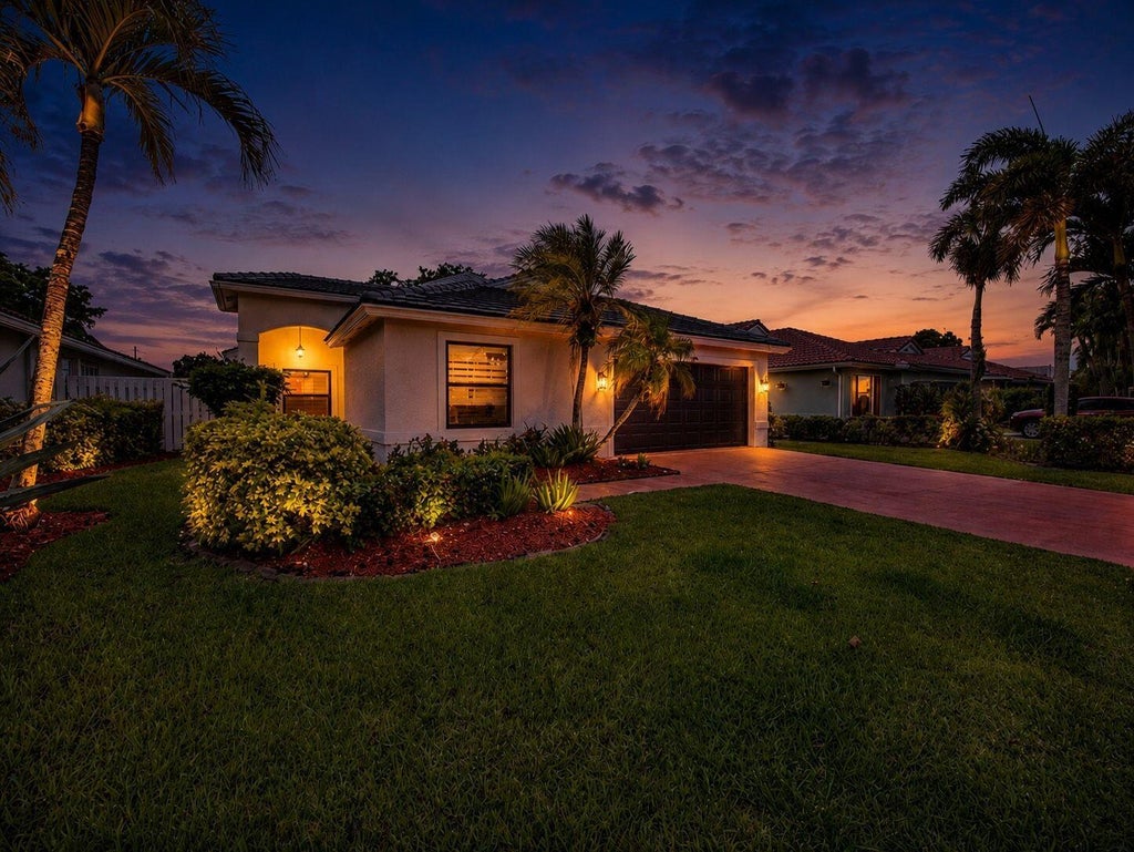 Photo of 6244 Grand Cypress Circle, Lake Worth, FL 33463 (MLS # B26037560)