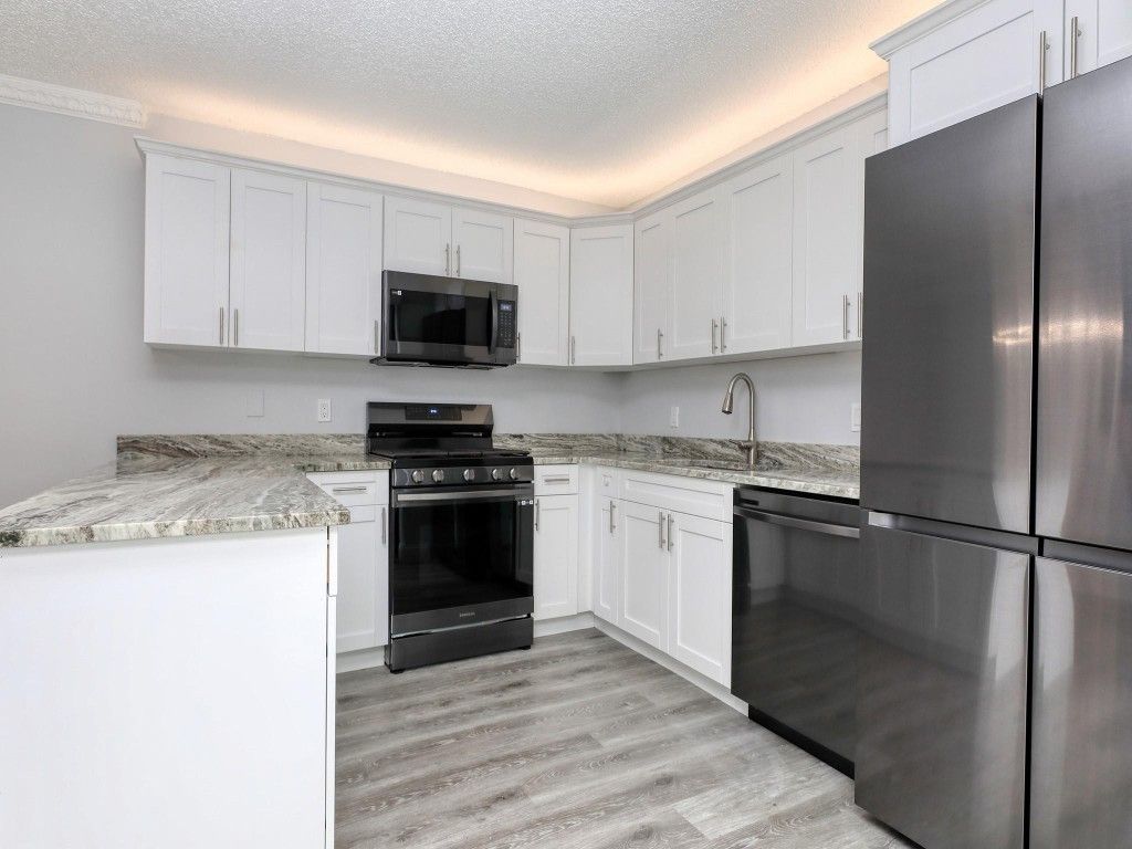 Photo of 2145 White Pine Circle #D, Greenacres, FL 33415 (MLS # F10411893)