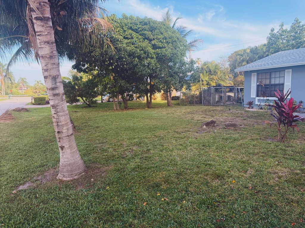 Photo of 5437 Greenwood Drive, Delray Beach, FL 33484 (MLS # B26029060)