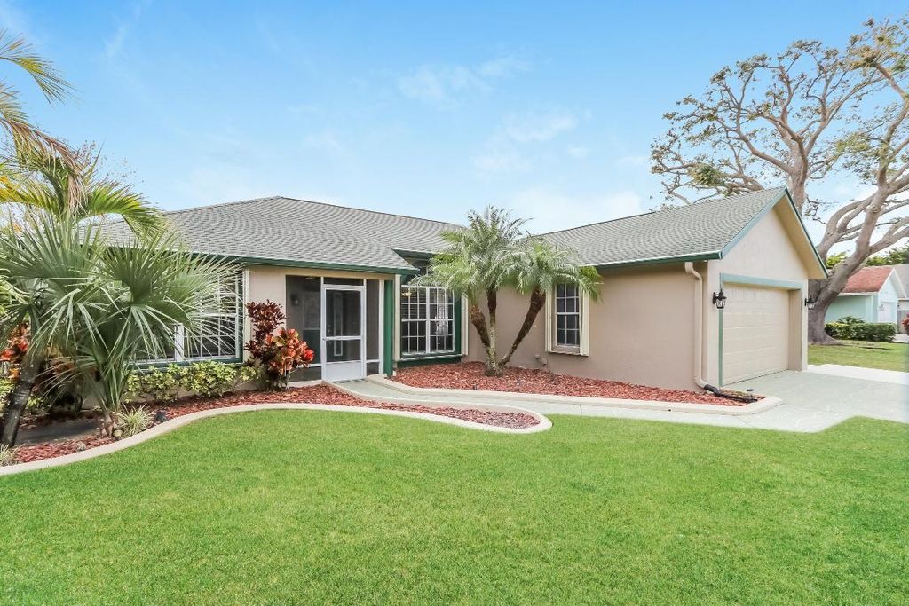Photo of 820 SW Dalton Avenue, Port Saint Lucie, FL 34953 (MLS # R10976170)