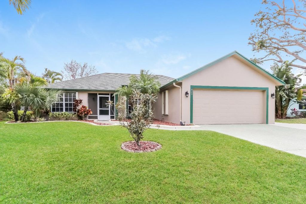 Photo of 820 SW Dalton Avenue, Port Saint Lucie, FL 34953 (MLS # R10976170)