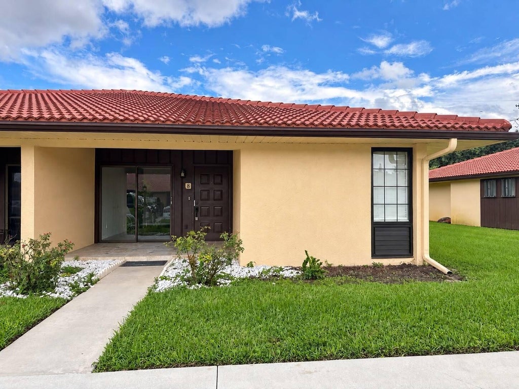 Photo of 5933 FOREST HILL Boulevard #8, West Palm Beach, FL 33415 (MLS # B26078354)
