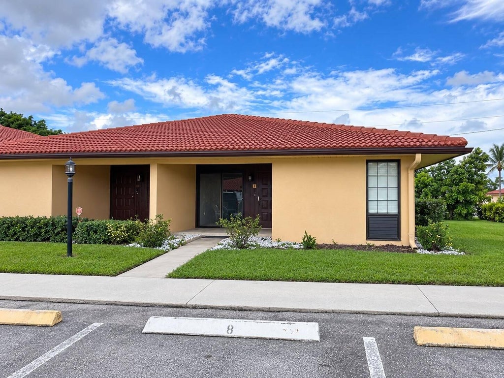 Photo of 5933 FOREST HILL Boulevard #8, West Palm Beach, FL 33415 (MLS # B26078354)