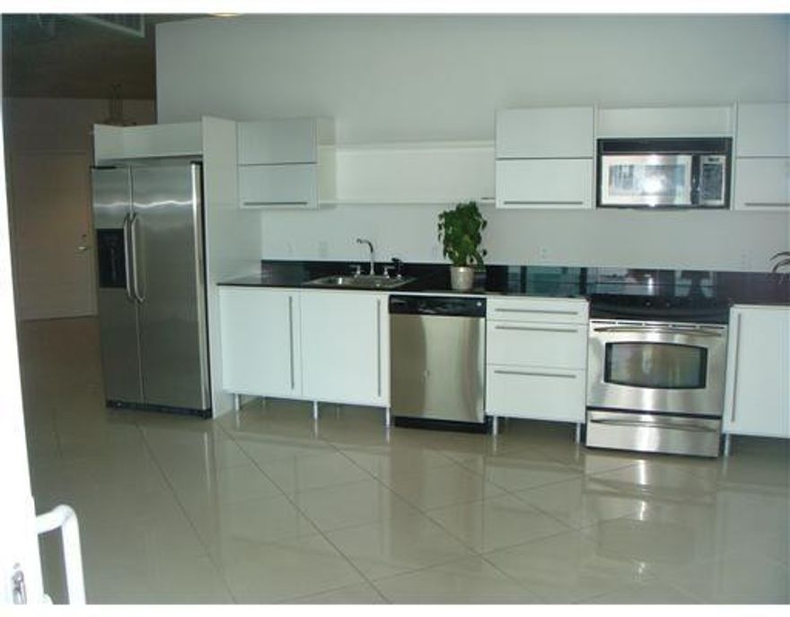 Unfurnished unit on 14th floor in the heart of Brickell. Enjoy the beautiful Miami views from the balcony. Open kitchen with granite countertops. Central AC. Washer and dryer in the unit. Assigned covered parking space. Water/sewer/trash pickup included in the rent. All ages/kids welcome. 24/7 secured building with concierge, 2 pools, jacuzzi, gym. Steps away from shopping, banks, restaurants, night life.