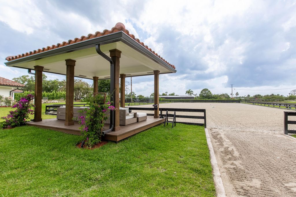 Photo of 14794 Rolling Rock Place, Wellington, FL 33414 (MLS # B26000320)