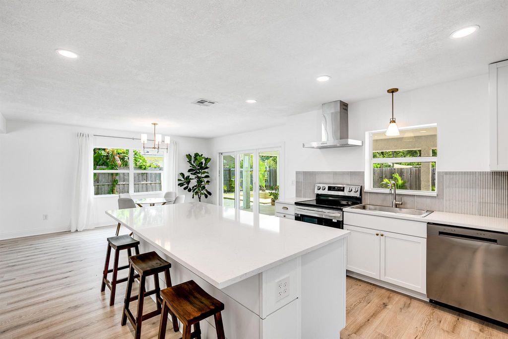 Photo of 1163 NW 12th Terrace, Stuart, FL 34994 (MLS # R10999802)