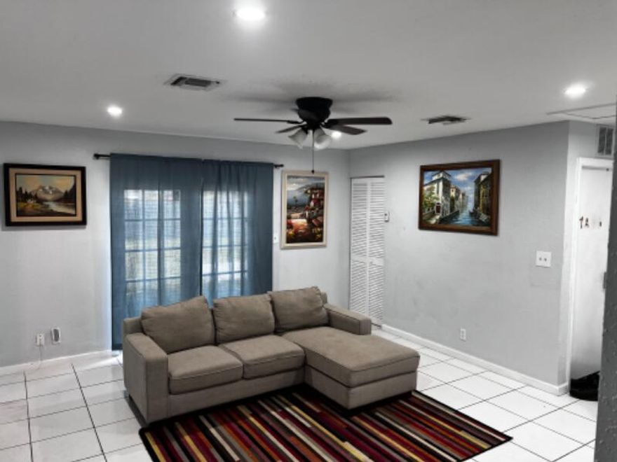 This is a private room with a shared bathroom in this large, spacious home! Common areas include kitchen, furnished dining room, living room, patio & backyard. Central AC, tile floors, laundry center & a big covered patio area and backyard with delicious mango tree. Close to I-95, shopping and the beach. There is plenty of parking spaces. Updated stainless appliances and Ring camera system installed for enhanced safety. Utilities (water & electric) and monthly cleaning service included. No pets allowed. First, last and security to move in. Background and credit check performed. Renters' insurance required.