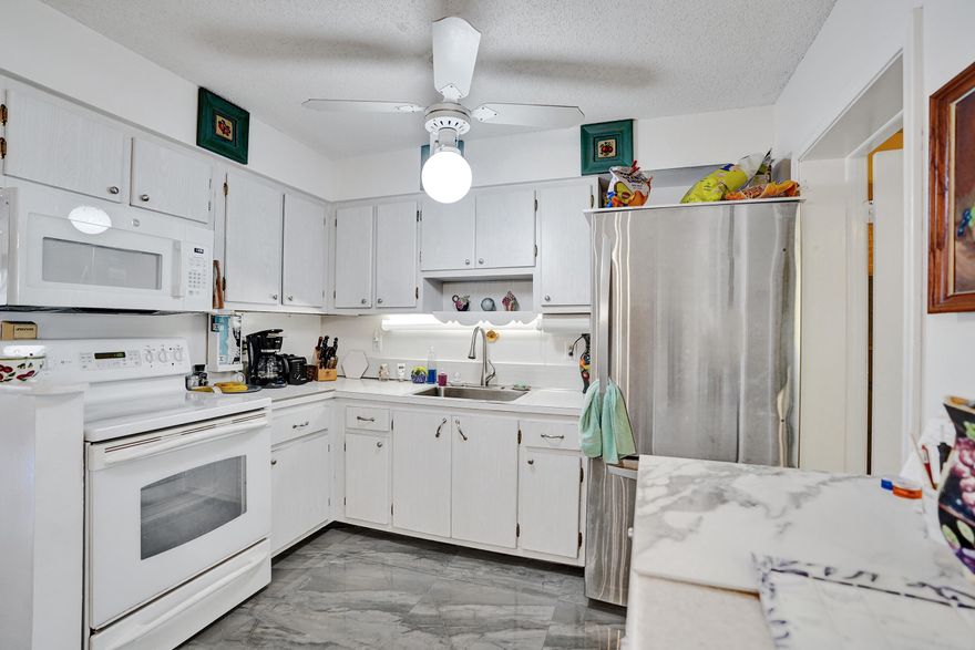 Charming 2-bedroom, 2-bathroom end-unit villa offering convenient one-level living in a highly desirable Delray Beach location. This well-maintained home features a one-year-old roof and includes a separate shed with a workshop--perfect for extra storage or hobbies. Don't miss this opportunity to own in a sought-after community!