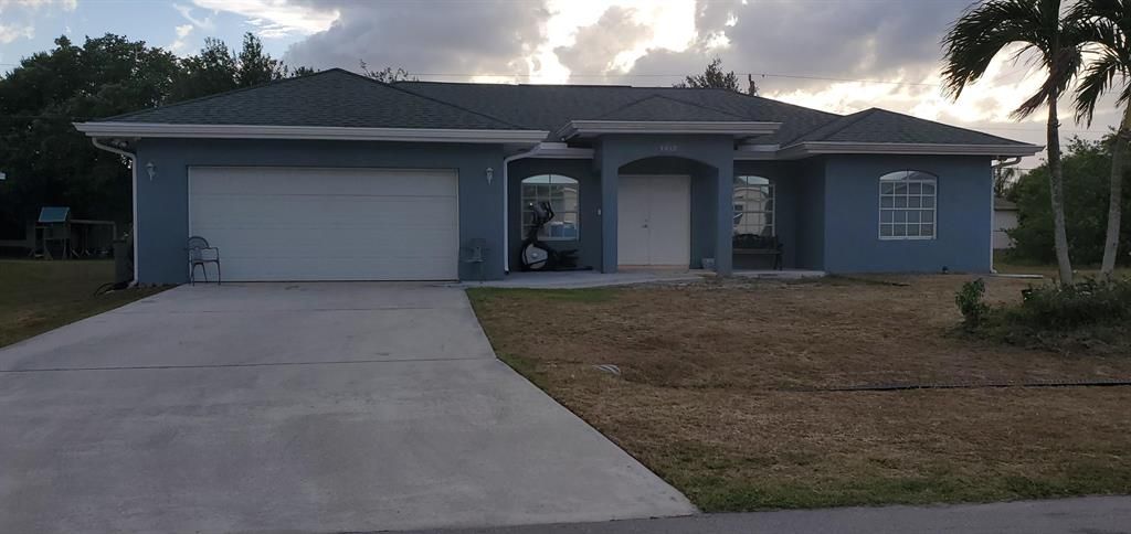 Photo of 3550 SW San Benito Street SW, Port Saint Lucie, FL 34953 (MLS # R10700499)