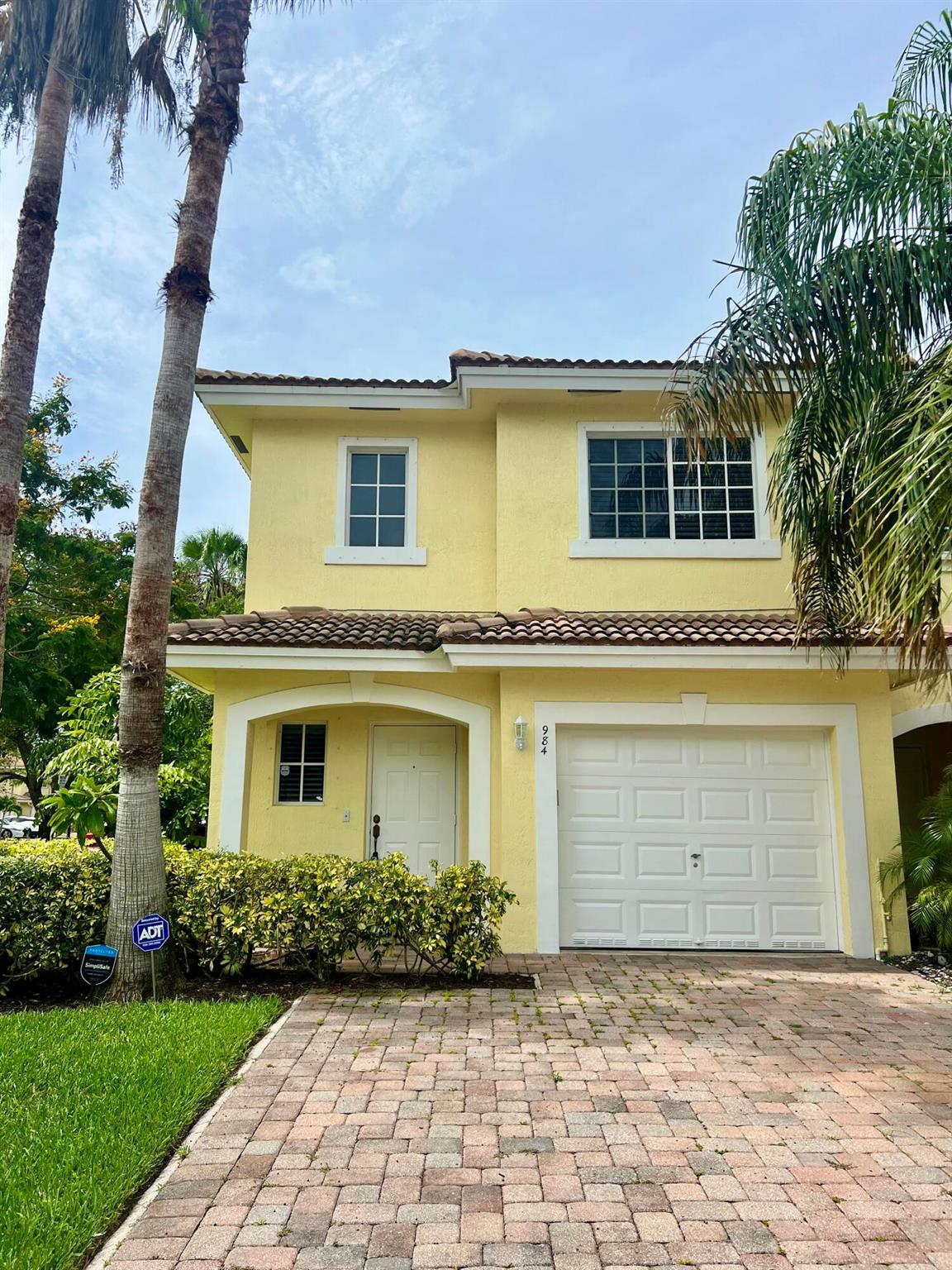 Welcome home to this beautiful 3 BR / 2.5 BTH remodeled townhome nestled in West Palm Beach. This home has everything you are looking for: remodeled kitchen and bathrooms, large, open concept floor plan, brand new washer & dryer, attached 1 car garage with additional room for storage, spacious primary suite with custom closet, nice sized guest rooms, & a corner lot which provides more space and more light to filter in. The community provides a pool, tot lot, and tennis court. You are also conveniently located to downtown West Palm Beach, major highways and thorough fairs and airports. Your perfect new home is ready for you to move-in!