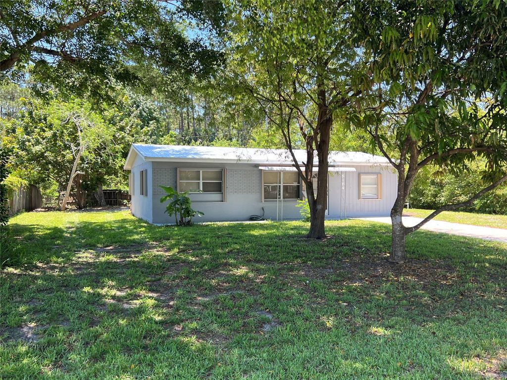 Photo of 6184 SE Orange Blossom Trl, Hobe Sound, FL 33455 (MLS # F10534279)
