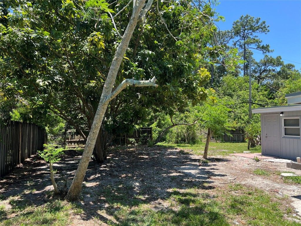 Photo of 6184 SE Orange Blossom Trail, Hobe Sound, FL 33455 (MLS # F10534279)