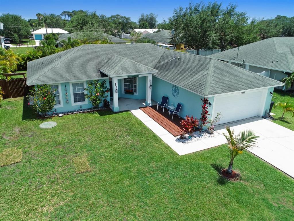 Photo of 2049 SW Beauregard Street, Port Saint Lucie, FL 34953 (MLS # R10709988)