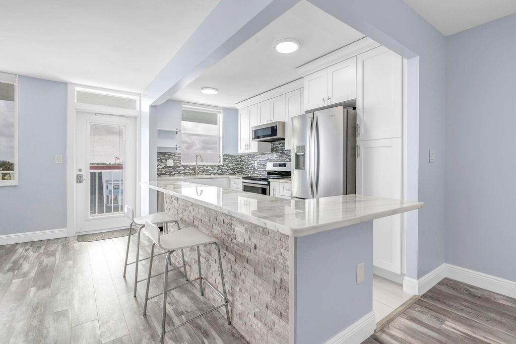 Photo of 108 Paradise Harbour Blvd #509, North Palm Beach, FL 33408 (MLS # R11066715)