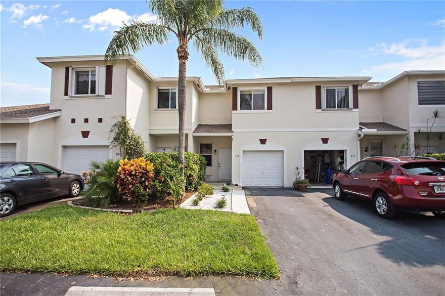 Town home with attached 1 car garage & 3 exterior parking spaces in desirable Crystal Lake Village. Ceramic tile downstairs & upgraded LED lighting throughout. Kitchen with white cabinets, stainless appliances & pendant lighting, sliders to screened porch. Downstairs half bath. Carpeted upstairs has laundry, two master suites, walk in closets & updated master bath. New roof 2016 & comm pool. HOA includes flood ins, roof, exterior & common area maintenance. Close to I95, turnpike, shopping center & beach.