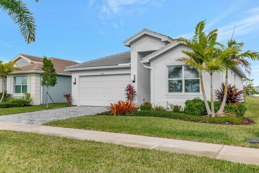 Photo of 13491 SW Indigo Inlet Lane, Port Saint Lucie, FL 34987 (MLS # R11045568)