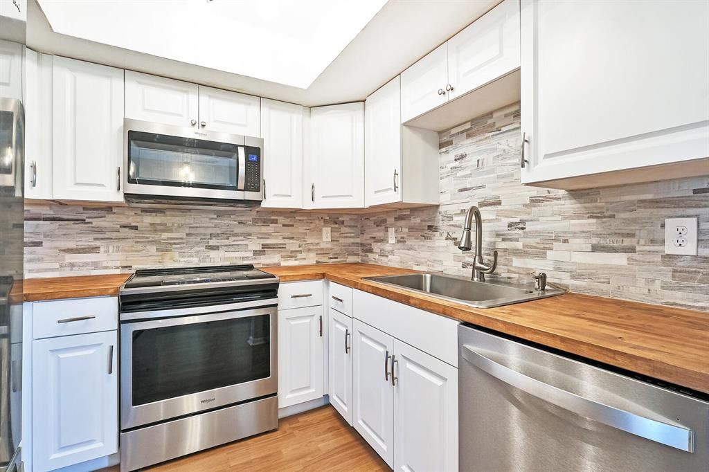 Photo of 10290 N Military Trail #5b, Palm Beach Gardens, FL 33410 (MLS # R10735112)