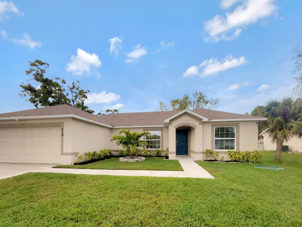Photo of 519 SW Butler Avenue, Port Saint Lucie, FL 34983 (MLS # R10967535)