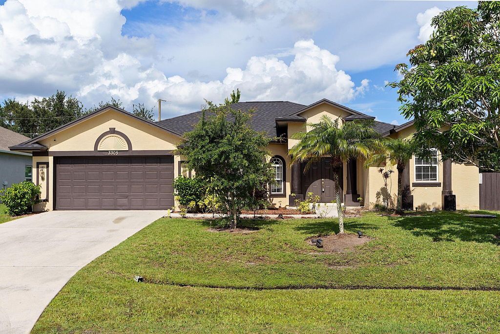 Photo of 3305 SW Frankford Street, Port Saint Lucie, FL 34953 (MLS # R10993656)