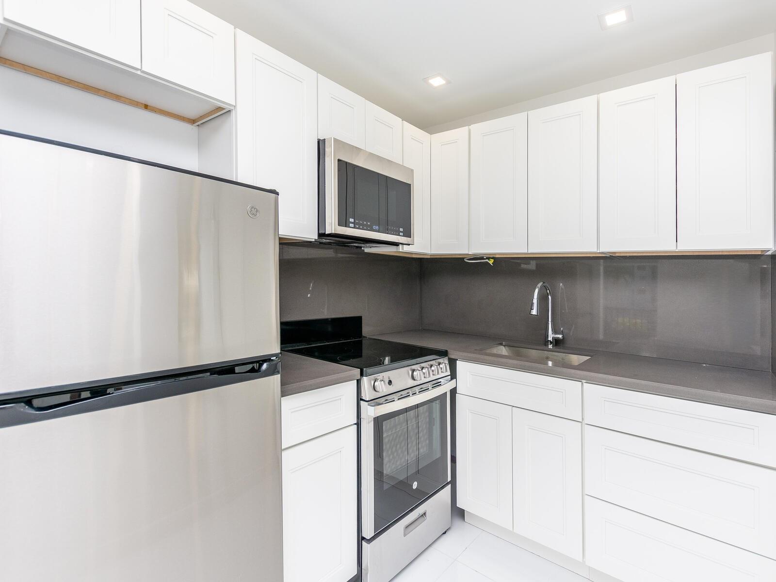 Stunning Renovated One-Bedroom Apartment in a Boutique Waterfront Building - Steps Away From the Beach, Restaurants, and Shops - Corner Unit - Impact Windows - Tons of Natural Light - Quartz Countertops - Porcelain Floors Throughout - Walk-in Closet w/ Built-Ins for Storage - 2 Balconies - Bay-View Pool - Laundry Facilities - This Apartment Combines Luxury with Convenience - Well-Maintained - It's a Must See