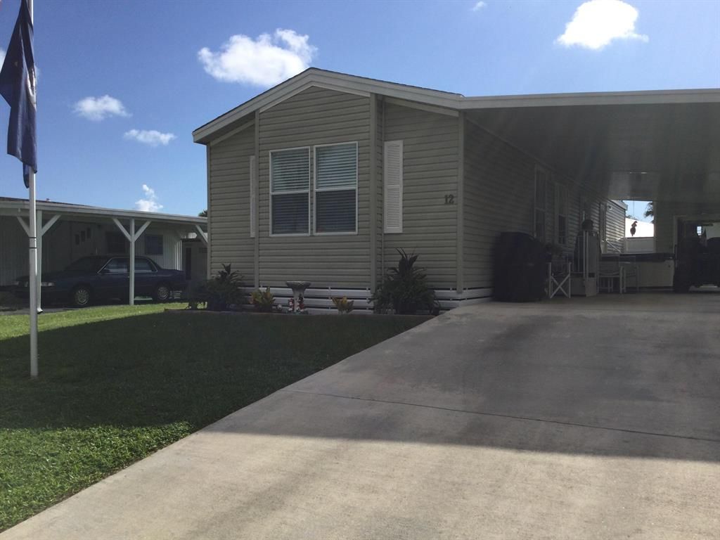 Photo of 12 Grande Vista Way, Port Saint Lucie, FL 34952 (MLS # R10741847)