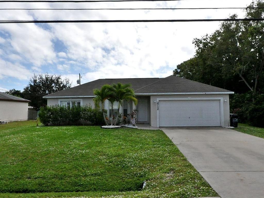 Photo of 2712 SE Melaleuca Boulevard, Port Saint Lucie, FL 34952 (MLS # R10749587)