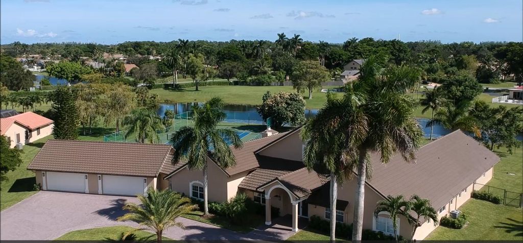 Photo of 21502 Sweetwater Lane S, Boca Raton, FL 33428 (MLS # B26027890)