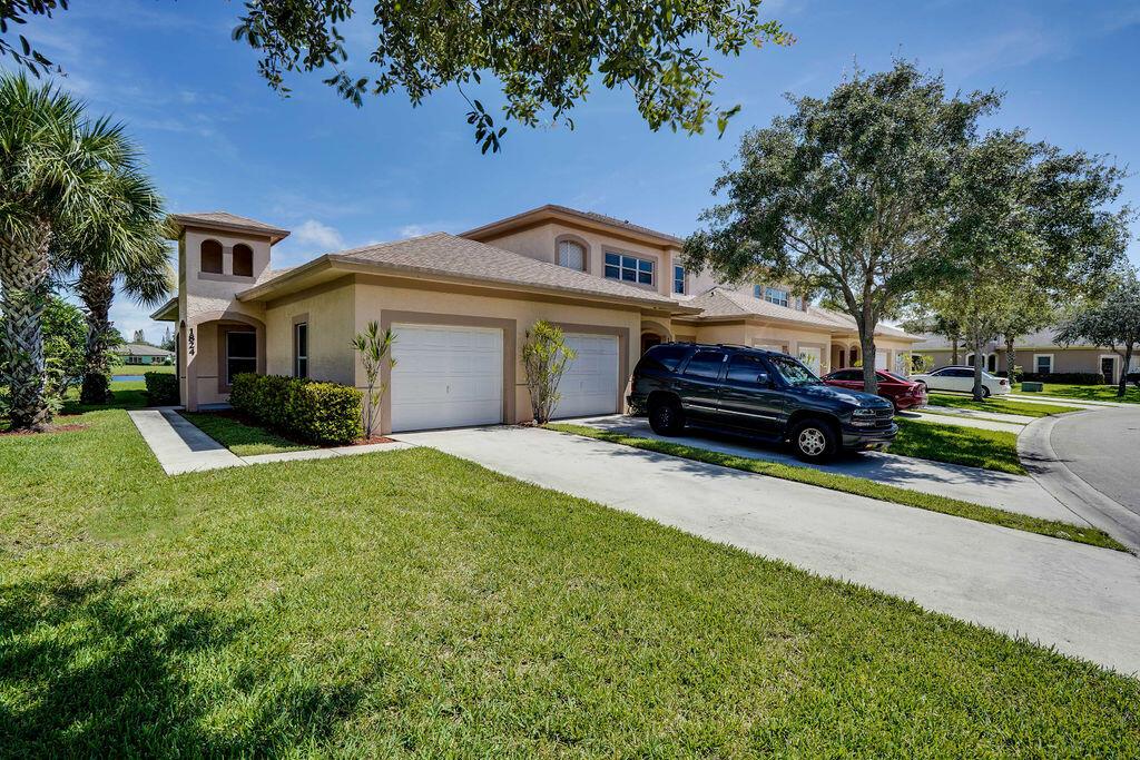 Beautiful Spacious 2 bedrooms 2 bathrooms, single car garage, water view home in a great location!! Close to everything. Laminate floors throughout. Covered screened patio. Very clean, open floor plan. Lots of amenities including a heated community pool, tennis