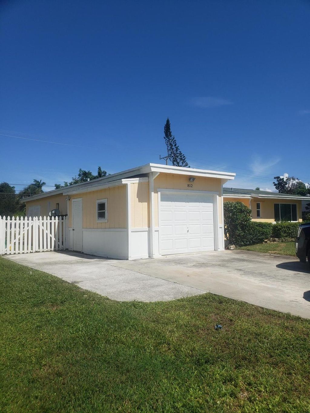 Photo of 812 Dogwood Road, North Palm Beach, FL 33408 (MLS # R11144091)