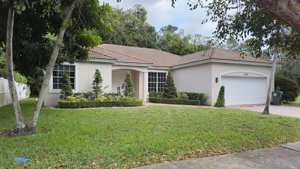 Photo of 5176 NW 50th Terrace, Coconut Creek, FL 33073 (MLS # B26016191)