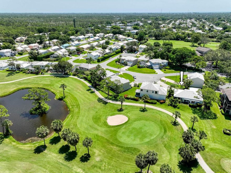 Three bedrooms, two baths PLUS A DEN/OFFICE surrounded by sweeping golf views- this low maintenance, single-level home offers the peaceful sanctuary you've been looking for! Upon entering you're greeted with endless natural light, vaulted ceilings, and views of the 6th and 7th hole of the Riverbend golf course from every room. Grill your dinner while you gaze over the golf green from your kitchen patio, or have a glass of wine with the sunset from your bedroom lanai. A third screened outdoor space surrounded by privacy hedges is the perfect place to lounge with a good book. This is a lightly used seasonal home with an optional golf membership and great bones: roof 2013, AC 2018, water heater 2016. North Passage hosts numerous amenities and is tucked away along the Loxahatchee River, located close to restaurants and shopping but away from the hustle & bustle. 15 minutes to the beach, 30 minutes to PBI Airport, 10 minutes to I-95/Turnpike.