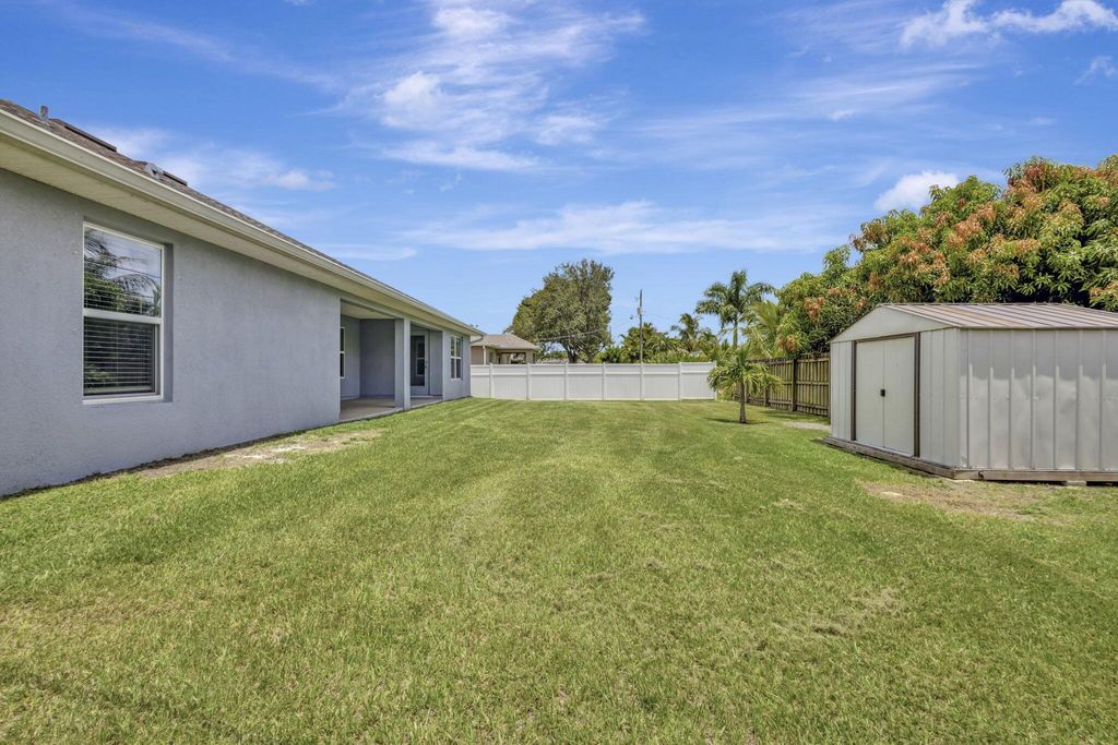 Photo of 6775 NW Abigail Avenue, Port Saint Lucie, FL 34983 (MLS # R11112347)