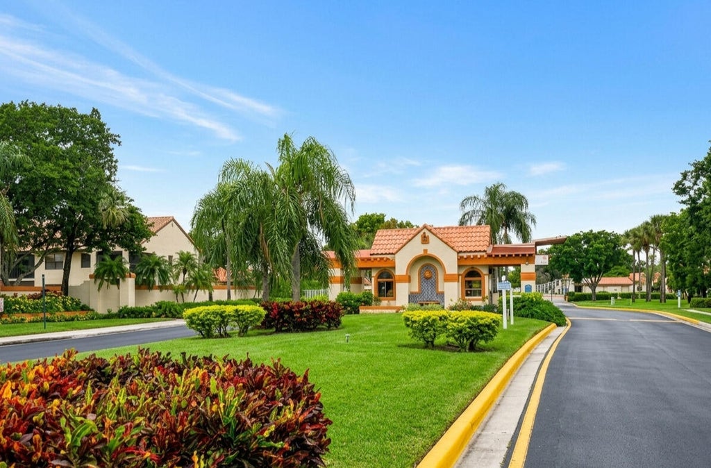 Photo of 25 Centennial Court, Deerfield Beach, FL 33442 (MLS # B26092335)