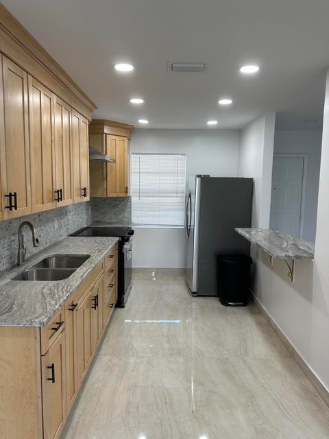 Tiny photo for 100 Lake Rebecca Drive, West Palm Beach, FL 33411 (MLS # B26036901)
