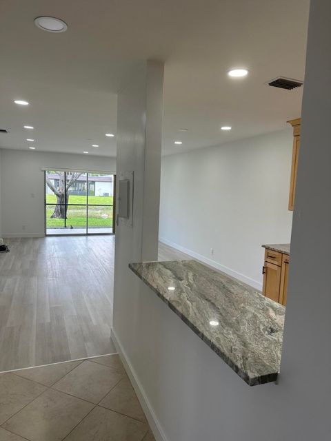 Tiny photo for 100 Lake Rebecca Drive, West Palm Beach, FL 33411 (MLS # B26036901)